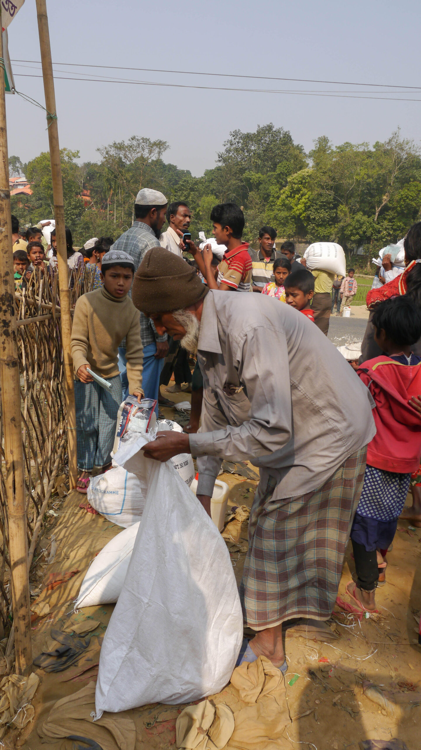 crowd distributing food